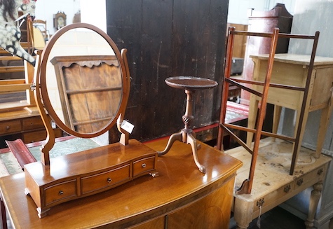 A George III style yew serpentine toilet mirror, height 64cm, together with a Victorian folding towel rail and a mahogany tripod wine table